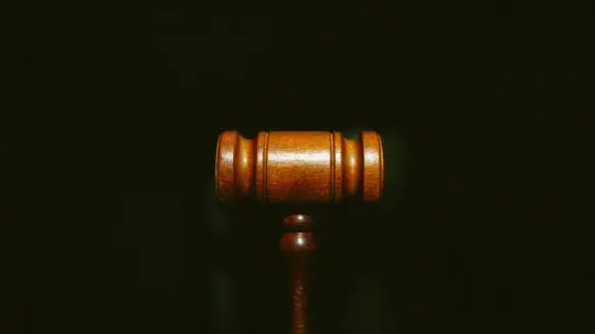 gavel on a black background