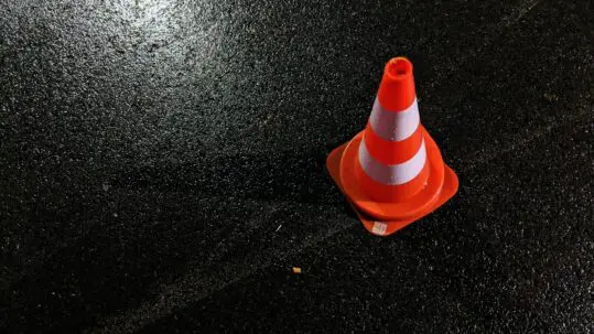 orange cone on black ground