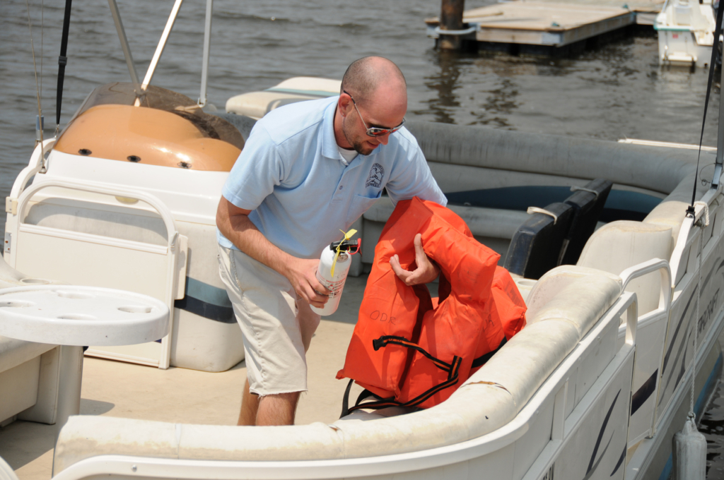 Man practicing boat safety