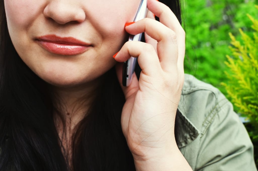 woman talking on phone