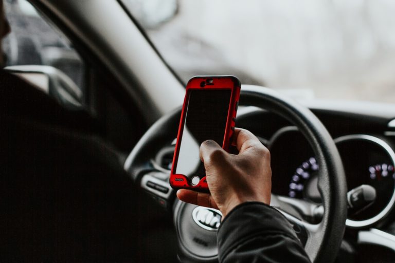 is it illegal to talk on the phone while driving in oklahoma